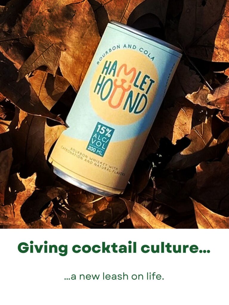 A can of hamlet hound bourbon and cola on a bed of leaves. The caption reads Giving cocktail culture... a new leash on life